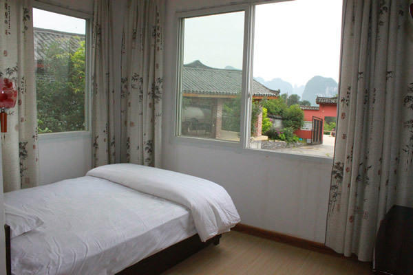 The Sleepy Teepee Hotel Yangshuo Rum bild