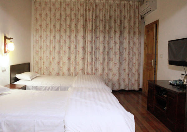 The Sleepy Teepee Hotel Yangshuo Rum bild