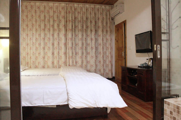 The Sleepy Teepee Hotel Yangshuo Rum bild