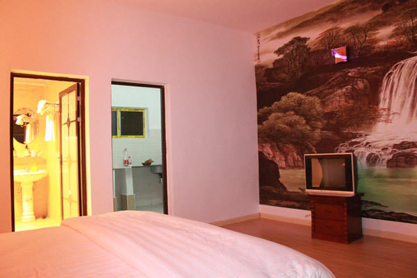 The Sleepy Teepee Hotel Yangshuo Rum bild